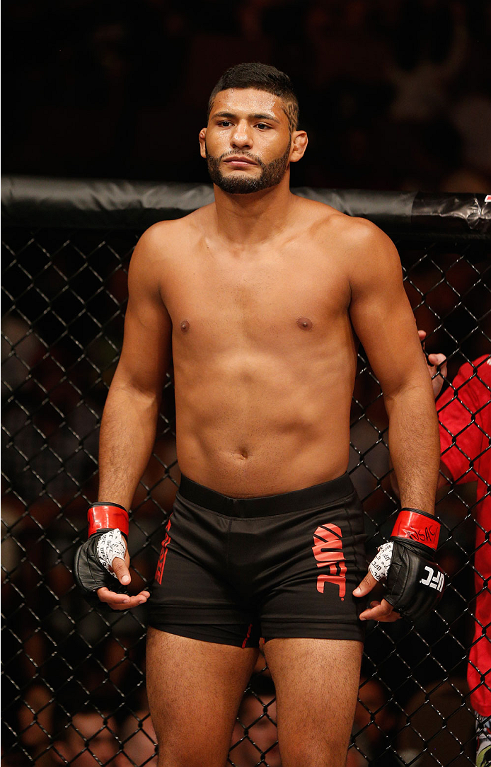 LAS VEGAS, NV - JULY 06:  Dhiego Lima enters the Octagon in his middleweight fight with Eddie Gordon during the Ultimate Fighter Finale inside the Mandalay Bay Events Center on July 6, 2014 in Las Vegas, Nevada.  (Photo by Josh Hedges/Zuffa LLC/Zuffa LLC 