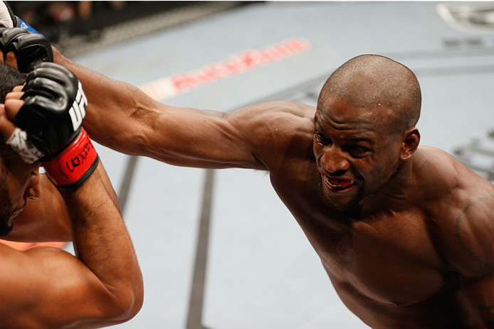 LAS VEGAS, NV - JULY 06:  (R-L) Eddie Gordon punches Dhiego Lima in their middleweight fight during the Ultimate Fighter Finale inside the Mandalay Bay Events Center on July 6, 2014 in Las Vegas, Nevada.  (Photo by Josh Hedges/Zuffa LLC/Zuffa LLC via Gett