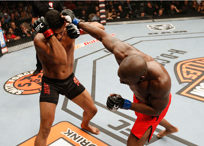 LAS VEGAS, NV - JULY 06: (R-L) Eddie Gordon punches Dhiego Lima in their middleweight fight during the Ultimate Fighter Finale inside the Mandalay Bay Events Center on July 6, 2014 in Las Vegas, Nevada. (Photo by Josh Hedges/Zuffa LLC/Zuffa LLC via Get