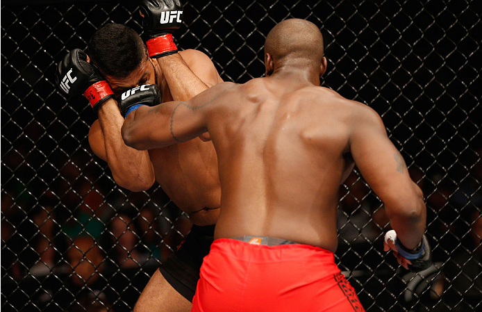 LAS VEGAS, NV - JULY 06: (R-L) Eddie Gordon punches Dhiego Lima in their middleweight fight during the Ultimate Fighter Finale inside the Mandalay Bay Events Center on July 6, 2014 in Las Vegas, Nevada. (Photo by Josh Hedges/Zuffa LLC/Zuffa LLC via Get