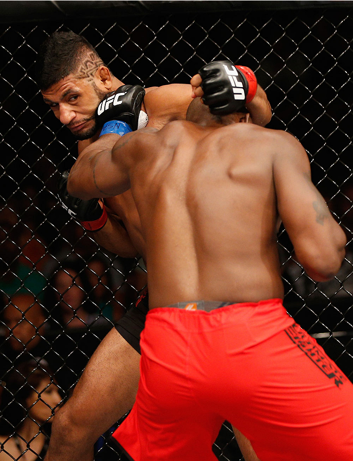 LAS VEGAS, NV - JULY 06: (R-L) Eddie Gordon punches Dhiego Lima in their middleweight fight during the Ultimate Fighter Finale inside the Mandalay Bay Events Center on July 6, 2014 in Las Vegas, Nevada. (Photo by Josh Hedges/Zuffa LLC/Zuffa LLC via Get