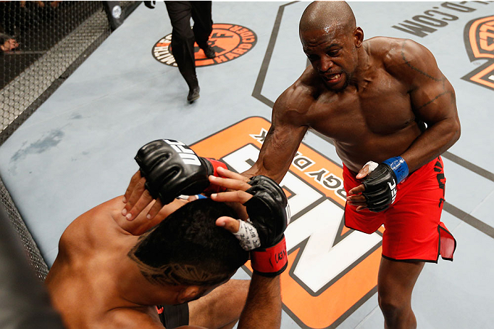 LAS VEGAS, NV - JULY 06: Eddie Gordon (top) punches Dhiego Lima in their middleweight fight during the Ultimate Fighter Finale inside the Mandalay Bay Events Center on July 6, 2014 in Las Vegas, Nevada. (Photo by Josh Hedges/Zuffa LLC/Zuffa LLC via Gett