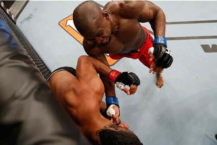 LAS VEGAS, NV - JULY 06: Eddie Gordon (top) punches Dhiego Lima in their middleweight fight during the Ultimate Fighter Finale inside the Mandalay Bay Events Center on July 6, 2014 in Las Vegas, Nevada. (Photo by Josh Hedges/Zuffa LLC/Zuffa LLC via Gett