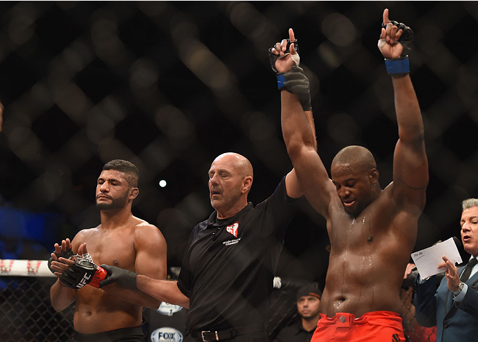 LAS VEGAS, NV - JULY 06: (R-L) Eddie Gordon celebrates after defeating Dhiego Lima in their middleweight fight during the Ultimate Fighter Finale inside the Mandalay Bay Events Center on July 6, 2014 in Las Vegas, Nevada. (Photo by Jeff Bottari/Zuffa LL