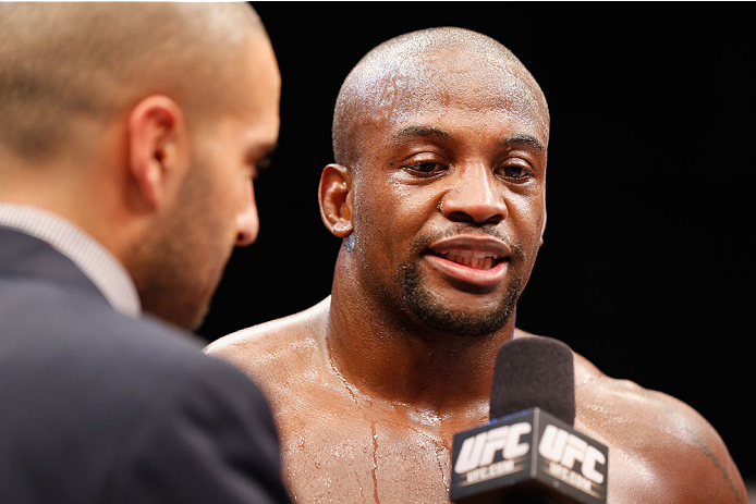LAS VEGAS, NV - JULY 06: (L-R) Jon Anik interviews Eddie Gordon after he defeated Dhiego Lima middleweight fight during the Ultimate Fighter Finale inside the Mandalay Bay Events Center on July 6, 2014 in Las Vegas, Nevada. (Photo by Josh Hedges/Zuffa L