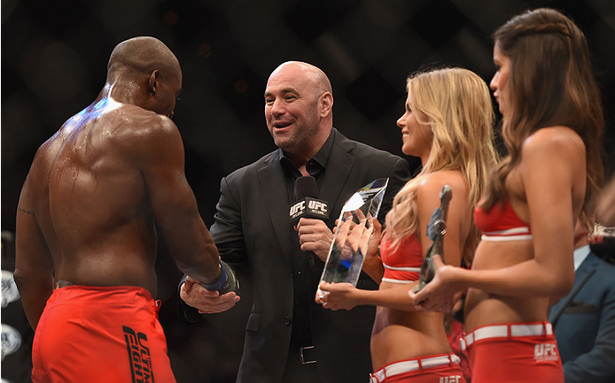 LAS VEGAS, NV - JULY 06: (R-L) UFC President Dana White presents Eddie Gordon with the Ultimate Fighter season 19 trophy in his middleweight fight during the Ultimate Fighter Finale inside the Mandalay Bay Events Center on July 6, 2014 in Las Vegas, Neva