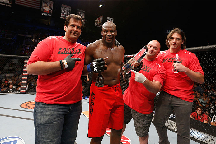 LAS VEGAS, NV - JULY 06:  Eddie Gordon celebrates with his coaches after defeating Dhiego Lima in their middleweight fight during the Ultimate Fighter Finale inside the Mandalay Bay Events Center on July 6, 2014 in Las Vegas, Nevada.  (Photo by Josh Hedge