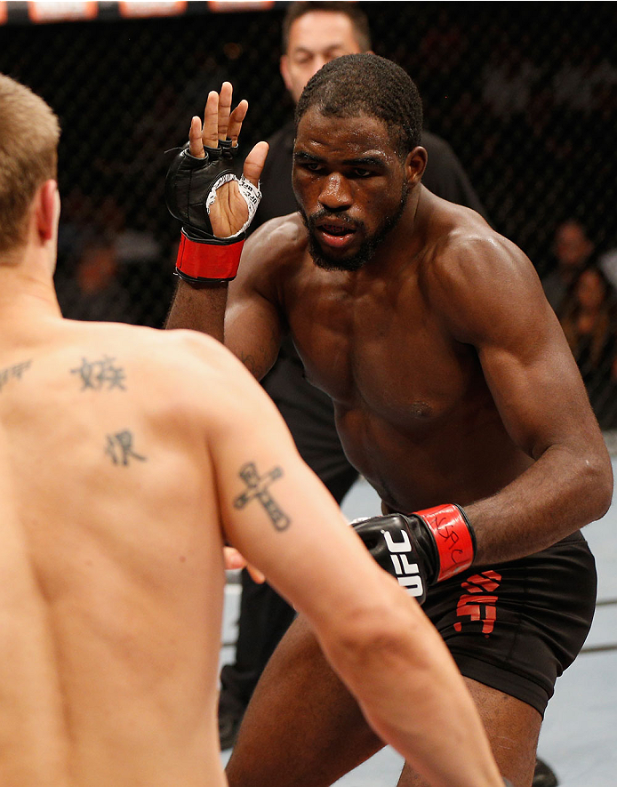 LAS VEGAS, NV - JULY 06: (R-L) Corey Anderson squares off with Matt Van Buren in their light heavyweight fight during the Ultimate Fighter Finale inside the Mandalay Bay Events Center on July 6, 2014 in Las Vegas, Nevada. (Photo by Josh Hedges/Zuffa LLC