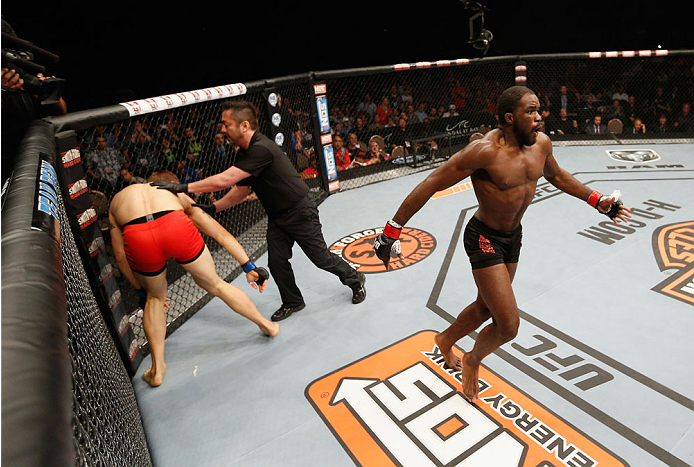 LAS VEGAS, NV - JULY 06:  (R-L) Corey Anderson celebrates after defeating Matt Van Buren in their light heavyweight fight during the Ultimate Fighter Finale inside the Mandalay Bay Events Center on July 6, 2014 in Las Vegas, Nevada.  (Photo by Josh Hedges