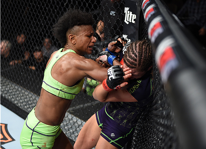 LAS VEGAS, NEVADA - DECEMBER 12: (L-R) Angela Hill elbows Emily Kagan in their strawweight fight during The Ultimate Fighter Finale event inside the Pearl concert theater at the Palms Casino Resort on December 12, 2014 in Las Vegas, Nevada. (Photo by Jeff