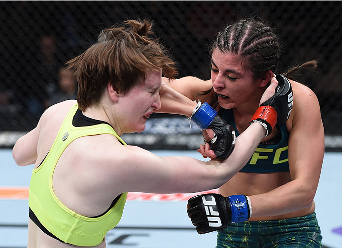 LAS VEGAS, NEVADA - DECEMBER 12: (R-L) Alex Chambers elbows Aisling Daly in their strawweight fight during The Ultimate Fighter Finale event inside the Pearl concert theater at the Palms Casino Resort on December 12, 2014 in Las Vegas, Nevada. (Photo by