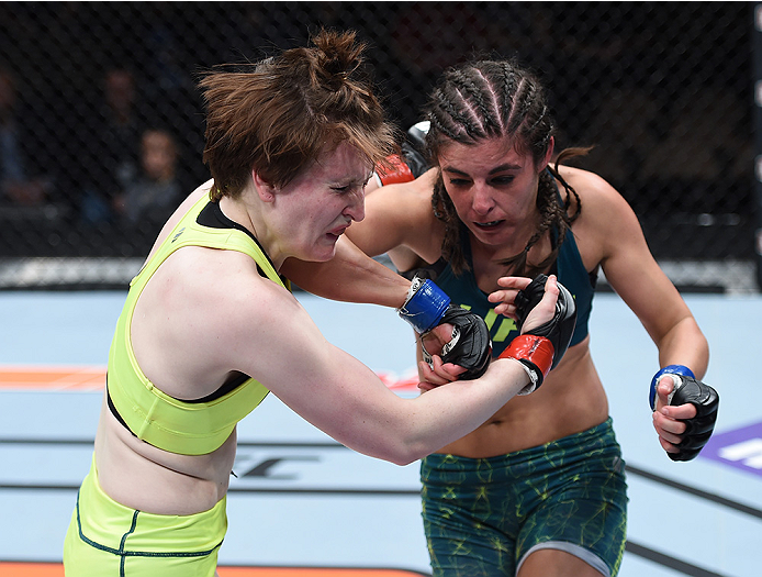 LAS VEGAS, NEVADA - DECEMBER 12: (R-L) Alex Chambers elbows Aisling Daly in their strawweight fight during The Ultimate Fighter Finale event inside the Pearl concert theater at the Palms Casino Resort on December 12, 2014 in Las Vegas, Nevada. (Photo by