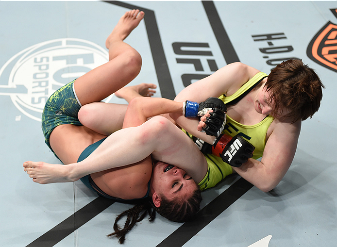 LAS VEGAS, NEVADA - DECEMBER 12: (R-L) Aisling Daly attempts to submit Alex Chambers in their strawweight fight during The Ultimate Fighter Finale event inside the Pearl concert theater at the Palms Casino Resort on December 12, 2014 in Las Vegas, Nevada