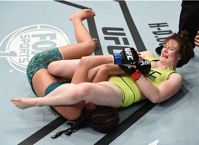 LAS VEGAS, NEVADA - DECEMBER 12: (R-L) Aisling Daly attempts to submit Alex Chambers in their strawweight fight during The Ultimate Fighter Finale event inside the Pearl concert theater at the Palms Casino Resort on December 12, 2014 in Las Vegas, Nevada