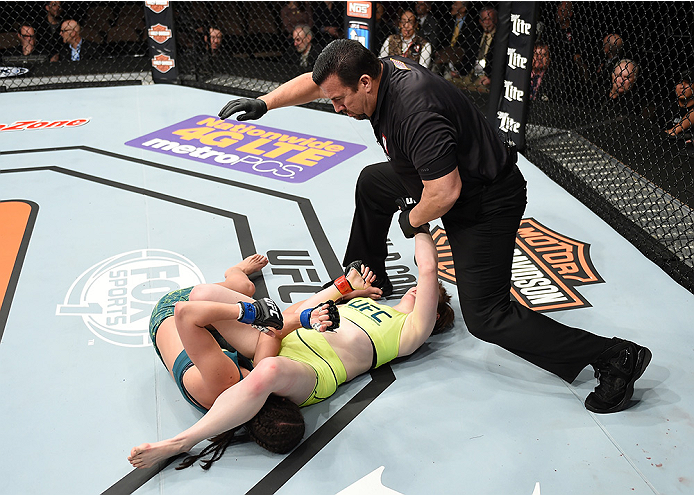 LAS VEGAS, NEVADA - DECEMBER 12: (R-L) Aisling Daly submits Alex Chambers in their strawweight fight during The Ultimate Fighter Finale event inside the Pearl concert theater at the Palms Casino Resort on December 12, 2014 in Las Vegas, Nevada. (Photo by