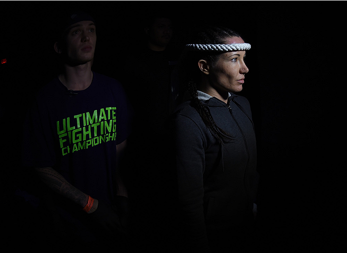 LAS VEGAS, NEVADA - DECEMBER 12: Angela Magana prepares to enter the Octagon before facing Tecia Torres in their strawweight fight during The Ultimate Fighter Finale event inside the Pearl concert theater at the Palms Casino Resort on December 12, 2014 i