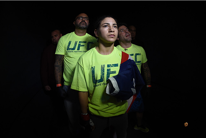 LAS VEGAS, NEVADA - DECEMBER 12: Tecia Torres prepares to enter the Octagon before facing Angela Magana in their strawweight fight during The Ultimate Fighter Finale event inside the Pearl concert theater at the Palms Casino Resort on December 12, 2014 i