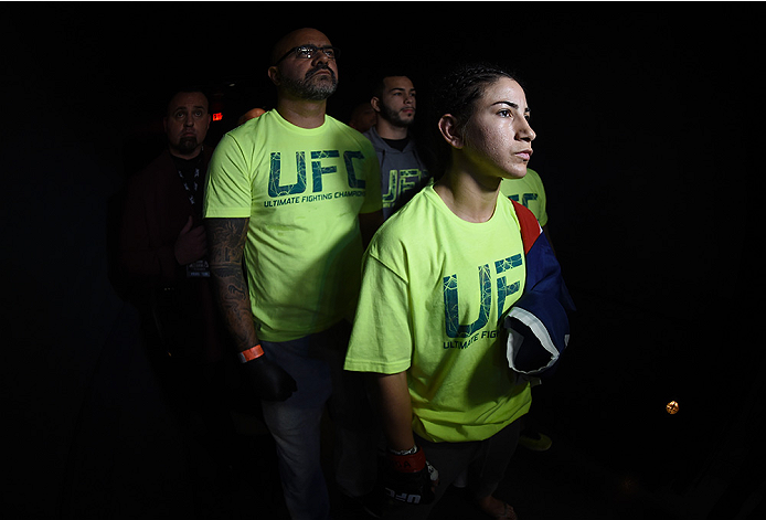 LAS VEGAS, NEVADA - DECEMBER 12: Tecia Torres prepares to enter the Octagon before facing Angela Magana in their strawweight fight during The Ultimate Fighter Finale event inside the Pearl concert theater at the Palms Casino Resort on December 12, 2014 i