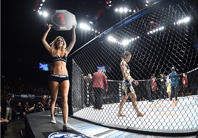 LAS VEGAS, NEVADA - DECEMBER 12: UFC Octagon girl Chrissy Blair introduces the round during The Ultimate Fighter Finale event inside the Palms Casino Resort on December 12, 2014 in Las Vegas, Nevada. (Photo by Jeff Bottari/Zuffa LLC/Zuffa LLC via Getty Im