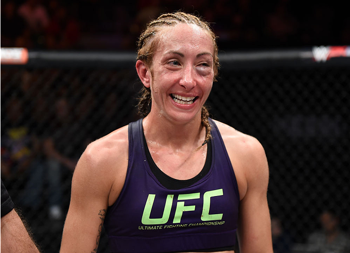 LAS VEGAS, NEVADA - DECEMBER 12: Heather Jo Clark smiles after her fight against Bec Rawlings in their strawweight fight during The Ultimate Fighter Finale event inside the Pearl concert theater at the Palms Casino Resort on December 12, 2014 in Las Vegas