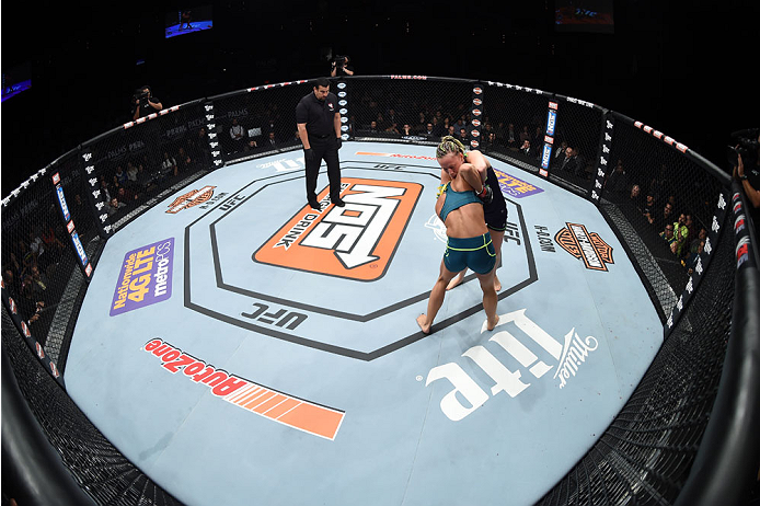 LAS VEGAS, NEVADA - DECEMBER 12: (R-L) Lisa Ellis attempts to submit Felice Heerig in their strawweight fight during The Ultimate Fighter Finale event inside the Pearl concert theater at the Palms Casino Resort on December 12, 2014 in Las Vegas, Nevada. (