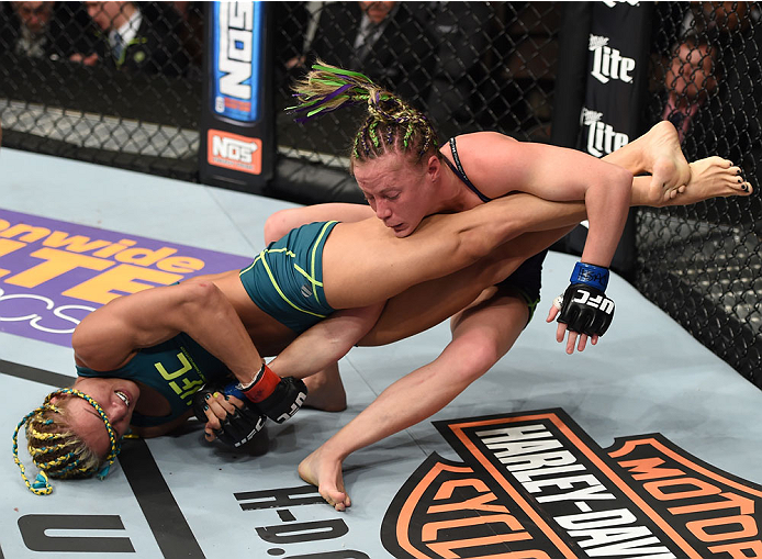 LAS VEGAS, NEVADA - DECEMBER 12: (L-R) Felice Herrig attempts to submit Lisa Ellis in their strawweight fight during The Ultimate Fighter Finale event inside the Pearl concert theater at the Palms Casino Resort on December 12, 2014 in Las Vegas, Nevada. (