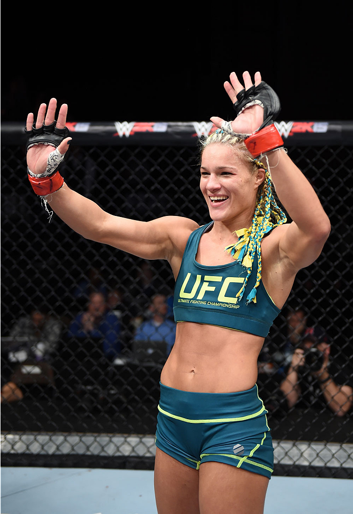 LAS VEGAS, NEVADA - DECEMBER 12: Felice Herrig celebrates her submission victory over Lisa Ellis in their strawweight fight during The Ultimate Fighter Finale event inside the Pearl concert theater at the Palms Casino Resort on December 12, 2014 in Las V