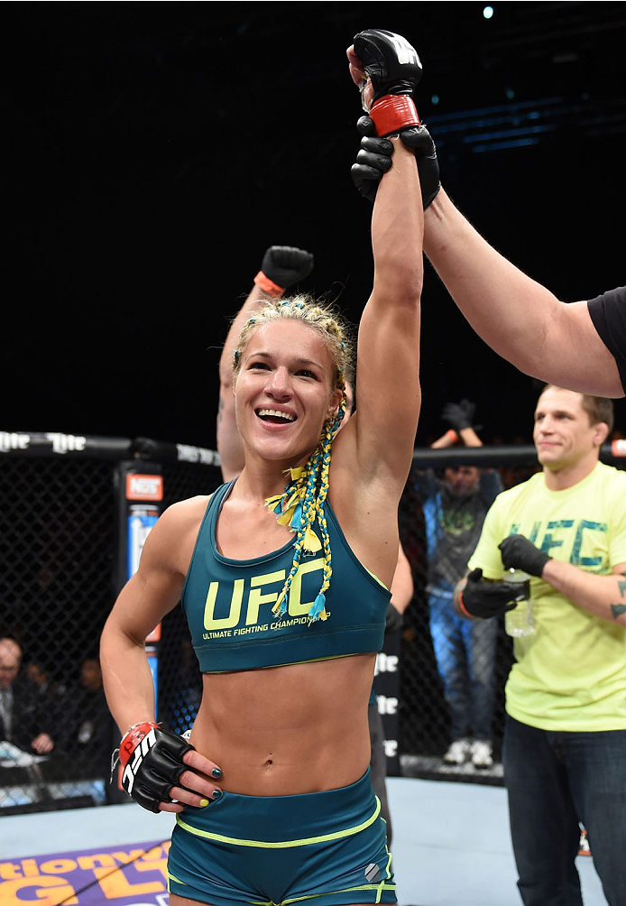 LAS VEGAS, NEVADA - DECEMBER 12: Felice Herrig celebrates her submission victory over Lisa Ellis in their strawweight fight during The Ultimate Fighter Finale event inside the Pearl concert theater at the Palms Casino Resort on December 12, 2014 in Las V