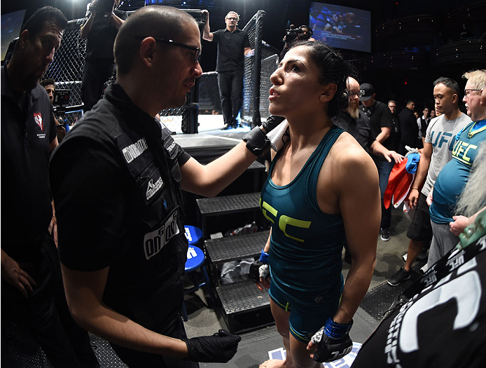 LAS VEGAS, NEVADA - DECEMBER 12: Randa Markos prepares to enter the Octagon before facing Jessica Penne in their strawweight fight during The Ultimate Fighter Finale event inside the Pearl concert theater at the Palms Casino Resort on December 12, 2014 i