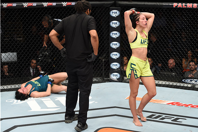 LAS VEGAS, NEVADA - DECEMBER 12: (R-L) Jessica Penne walks to her corner after her fight against Randa Markos in their strawweight fight during The Ultimate Fighter Finale event inside the Pearl concert theater at the Palms Casino Resort on December 12,