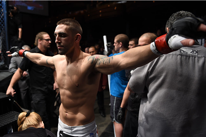 LAS VEGAS, NEVADA - DECEMBER 12: Joe Proctor prepares to enter the Octagon before facing Yancy Medeiros in their lightweight fight during The Ultimate Fighter Finale event inside the Pearl concert theater at the Palms Casino Resort on December 12, 2014 in