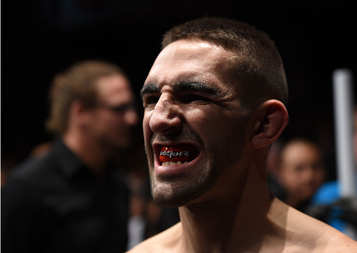 LAS VEGAS, NEVADA - DECEMBER 12: Joe Proctor prepares to enter the Octagon before facing Yancy Medeiros in their lightweight fight during The Ultimate Fighter Finale event inside the Pearl concert theater at the Palms Casino Resort on December 12, 2014 in