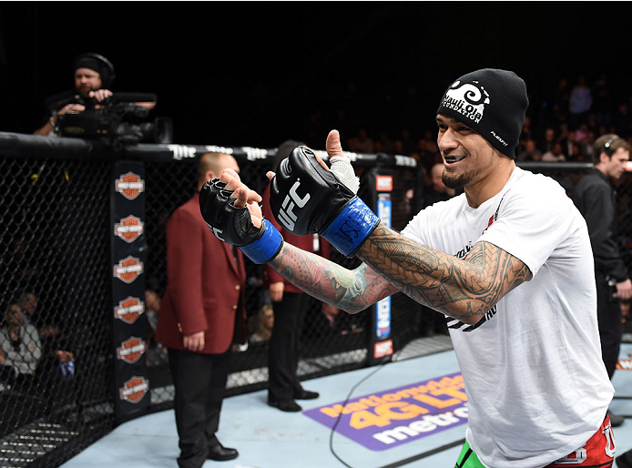 LAS VEGAS, NEVADA - DECEMBER 12: Yancy Medeiros celebrates his submission victory over Joe Proctor in their lightweight fight during The Ultimate Fighter Finale event inside the Pearl concert theater at the Palms Casino Resort on December 12, 2014 in Las