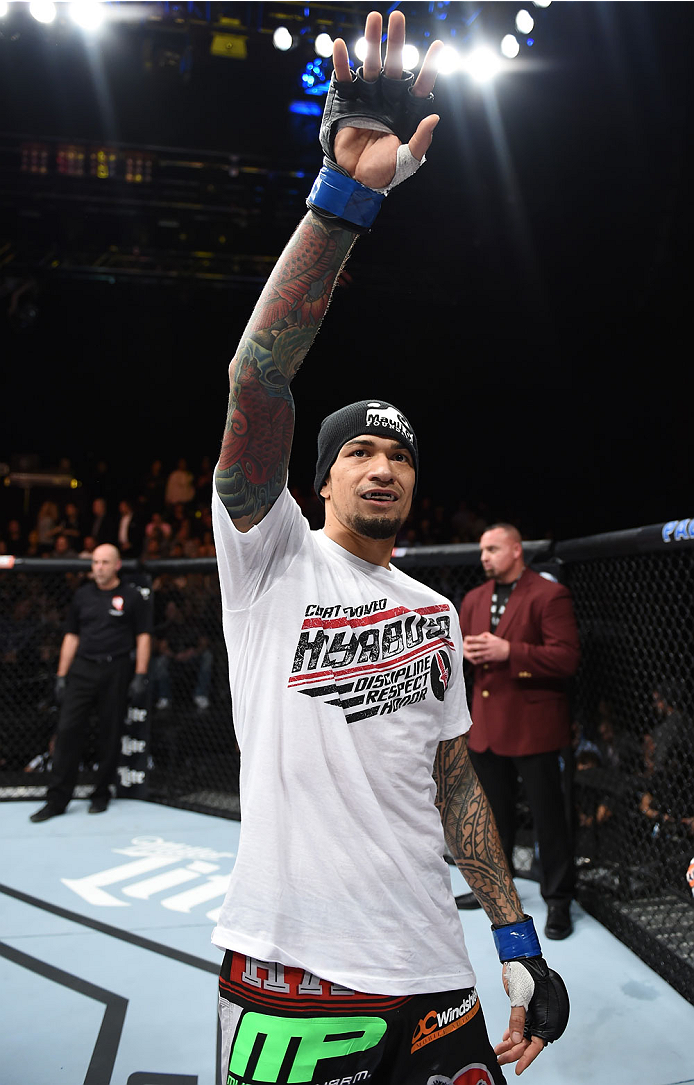 LAS VEGAS, NEVADA - DECEMBER 12: Yancy Medeiros celebrates his submission victory over Joe Proctor in their lightweight fight during The Ultimate Fighter Finale event inside the Pearl concert theater at the Palms Casino Resort on December 12, 2014 in Las