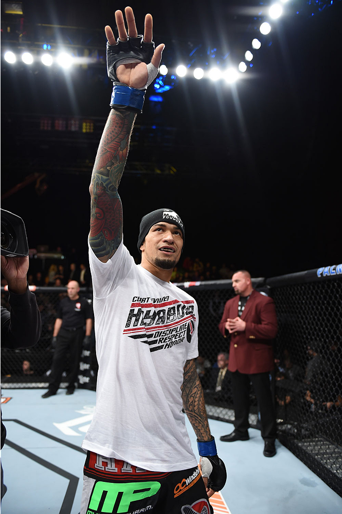 LAS VEGAS, NEVADA - DECEMBER 12: Yancy Medeiros celebrates his submission victory over Joe Proctor in their lightweight fight during The Ultimate Fighter Finale event inside the Pearl concert theater at the Palms Casino Resort on December 12, 2014 in Las