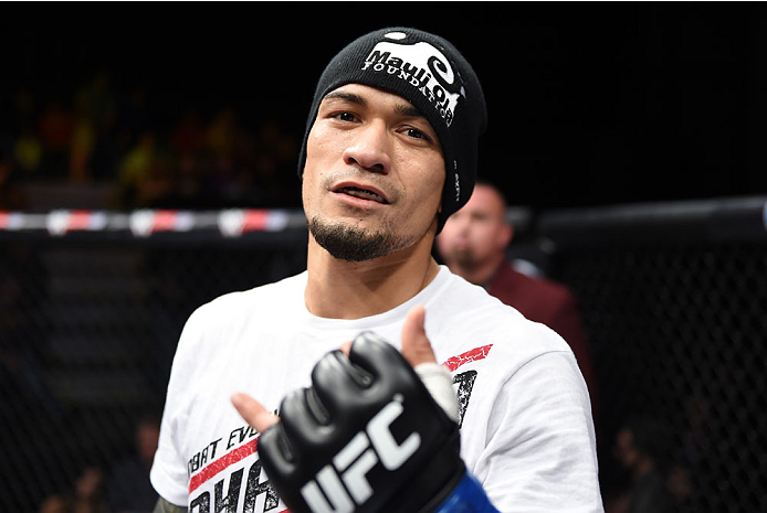 LAS VEGAS, NEVADA - DECEMBER 12: Yancy Medeiros celebrates his submission victory over Joe Proctor in their lightweight fight during The Ultimate Fighter Finale event inside the Pearl concert theater at the Palms Casino Resort on December 12, 2014 in Las