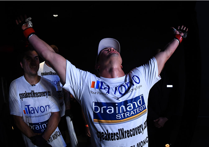 LAS VEGAS, NEVADA - DECEMBER 12: KJ Noons prepares to enter the Octagon before facing Daron Cruickshank in their lightweight fight during The Ultimate Fighter Finale event inside the Pearl concert theater at the Palms Casino Resort on December 12, 2014 in