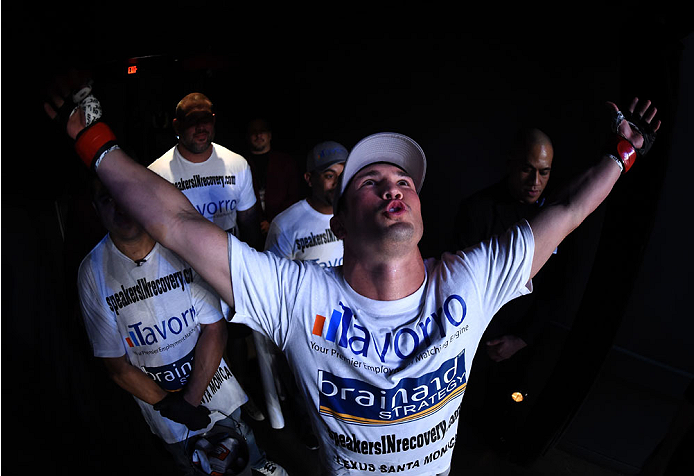 LAS VEGAS, NEVADA - DECEMBER 12: KJ Noons prepares to enter the Octagon before facing Daron Cruickshank in their lightweight fight during The Ultimate Fighter Finale event inside the Pearl concert theater at the Palms Casino Resort on December 12, 2014 in