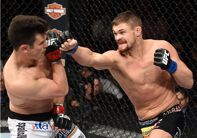 LAS VEGAS, NEVADA - DECEMBER 12: (R-L) Daron Cruickshank punches KJ Noons in their lightweight fight during The Ultimate Fighter Finale event inside the Pearl concert theater at the Palms Casino Resort on December 12, 2014 in Las Vegas, Nevada. (Photo by