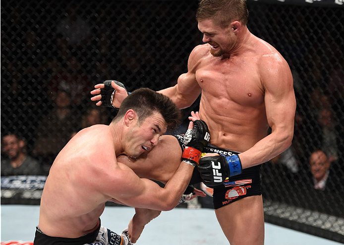 LAS VEGAS, NEVADA - DECEMBER 12: (R-L) Daron Cruickshank knees KJ Noons in their lightweight fight during The Ultimate Fighter Finale event inside the Pearl concert theater at the Palms Casino Resort on December 12, 2014 in Las Vegas, Nevada. (Photo by Je