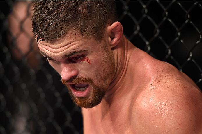 LAS VEGAS, NEVADA - DECEMBER 12: Daron Cruickshank walks to his corner after an accidental eye poke from KJ Noons in their lightweight fight during The Ultimate Fighter Finale event inside the Pearl concert theater at the Palms Casino Resort on December 1
