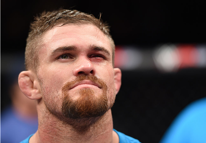 LAS VEGAS, NEVADA - DECEMBER 12: Daron Cruickshank and KJ Noons receive a no contest after an accidental eye poke in their lightweight fight during The Ultimate Fighter Finale event inside the Pearl concert theater at the Palms Casino Resort on December 1