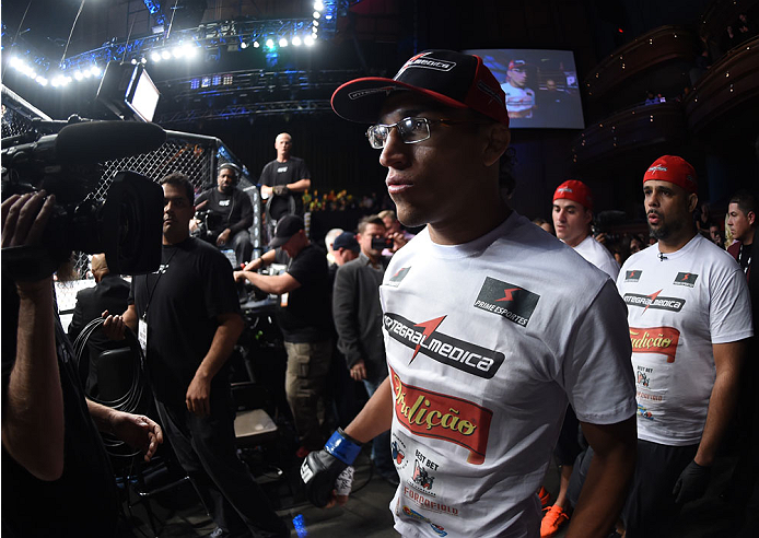 LAS VEGAS, NEVADA - DECEMBER 12: Charles Oliveira prepares to enter the Octagon before facing Jeremy Stephens in their lightweight fight during The Ultimate Fighter Finale event inside the Pearl concert theater at the Palms Casino Resort on December 12,