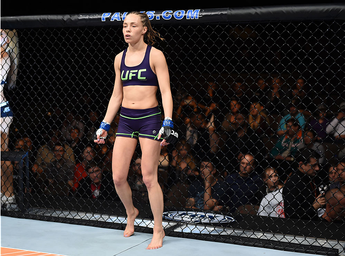 LAS VEGAS, NEVADA - DECEMBER 12: Rose Namajunas enters the Octagon before facing Carla Esparza in their strawweight championship fight during The Ultimate Fighter Finale event inside the Pearl concert theater at the Palms Casino Resort on December 12, 201