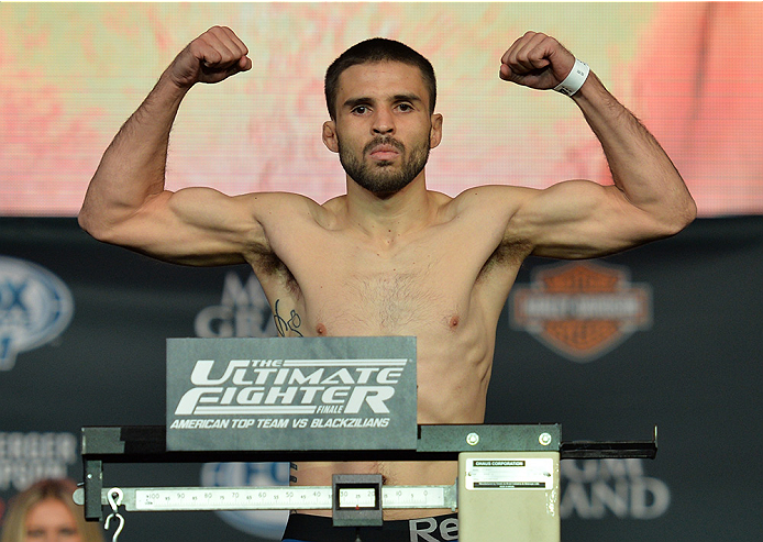 LAS VEGAS, NEVADA - JULY 11:   Darrell Montague steps onto the scale during the TUF 21 Finale Weigh-in at the UFC Fan Expo in the Sands Expo and Convention Center on July 11, 2015 in Las Vegas Nevada. (Photo by Brandon Magnus/Zuffa LLC/Zuffa LLC via Getty