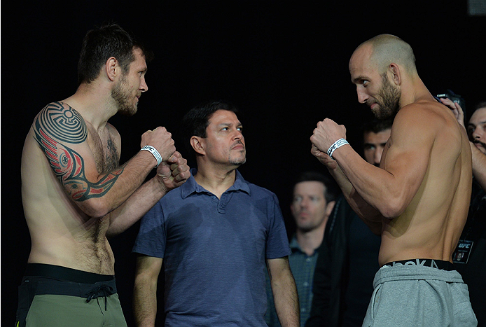 LAS VEGAS, NEVADA - JULY 11:   Dan Miller and Trevor Smith face off during the TUF 21 Finale Weigh-in at the UFC Fan Expo in the Sands Expo and Convention Center on July 11, 2015 in Las Vegas Nevada. (Photo by Brandon Magnus/Zuffa LLC/Zuffa LLC via Getty 