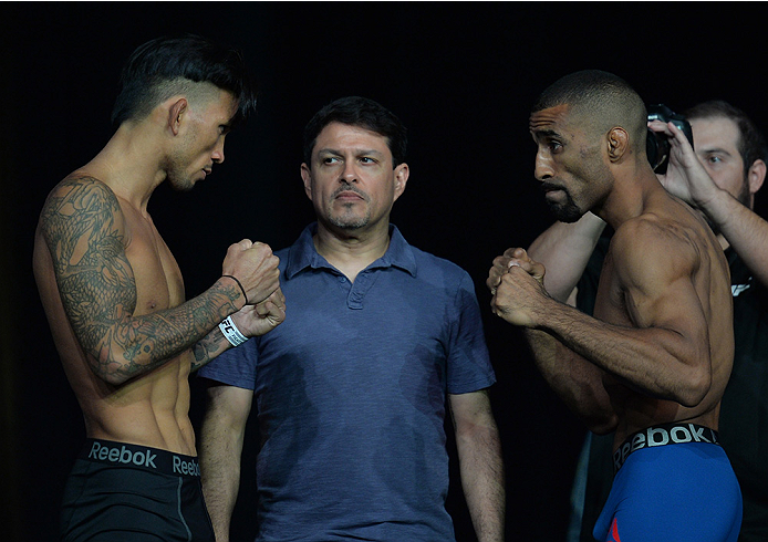 LAS VEGAS, NEVADA - JULY 11:   Russell Doane and Jerrod Sanders face off during the TUF 21 Finale Weigh-in at the UFC Fan Expo in the Sands Expo and Convention Center on July 11, 2015 in Las Vegas Nevada. (Photo by Brandon Magnus/Zuffa LLC/Zuffa LLC via G