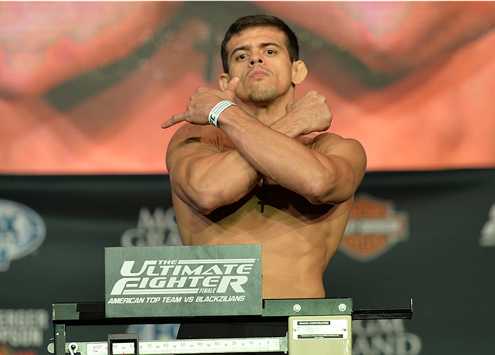 LAS VEGAS, NEVADA - JULY 11: Caio Magalhaes steps onto the scale during the TUF 21 Finale Weigh-in at the UFC Fan Expo in the Sands Expo and Convention Center on July 11, 2015 in Las Vegas Nevada. (Photo by Brandon Magnus/Zuffa LLC/Zuffa LLC via Getty I