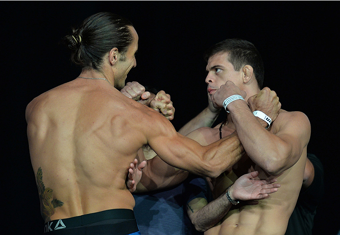 LAS VEGAS, NEVADA - JULY 11:   Josh Samman and Caio Magalhaes face off during the TUF 21 Finale Weigh-in at the UFC Fan Expo in the Sands Expo and Convention Center on July 11, 2015 in Las Vegas Nevada. (Photo by Brandon Magnus/Zuffa LLC/Zuffa LLC via Get