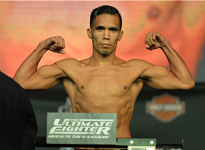 LAS VEGAS, NEVADA - JULY 11:   Mike De La Torre steps onto the scale during the TUF 21 Finale Weigh-in at the UFC Fan Expo in the Sands Expo and Convention Center on July 11, 2015 in Las Vegas Nevada. (Photo by Brandon Magnus/Zuffa LLC/Zuffa LLC via Getty